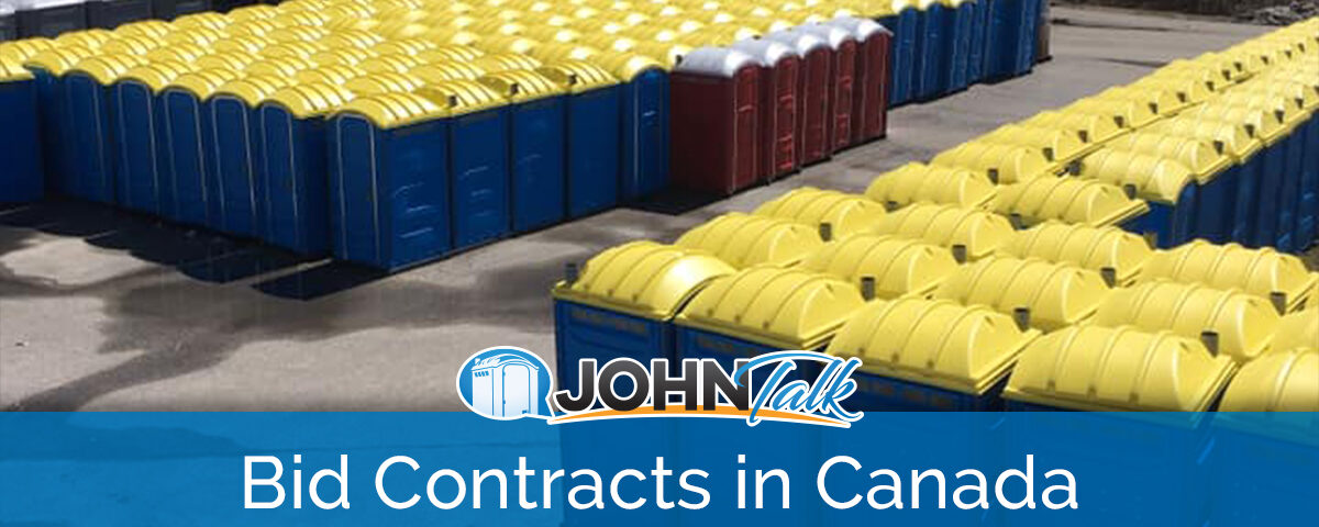 A business yard with many portable toilets in several different colors