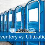 A row of blue portable toilets